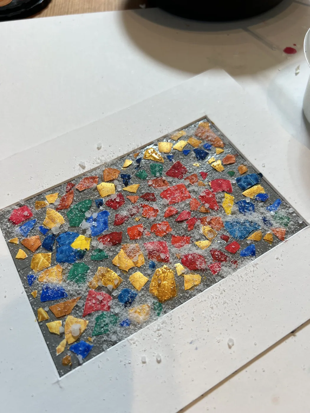 Eggshell mosaic sprinkled with silver glitter