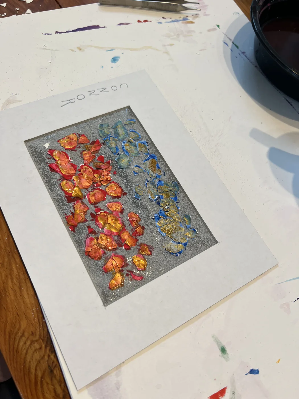 Small eggshell mosaic in orange and blue