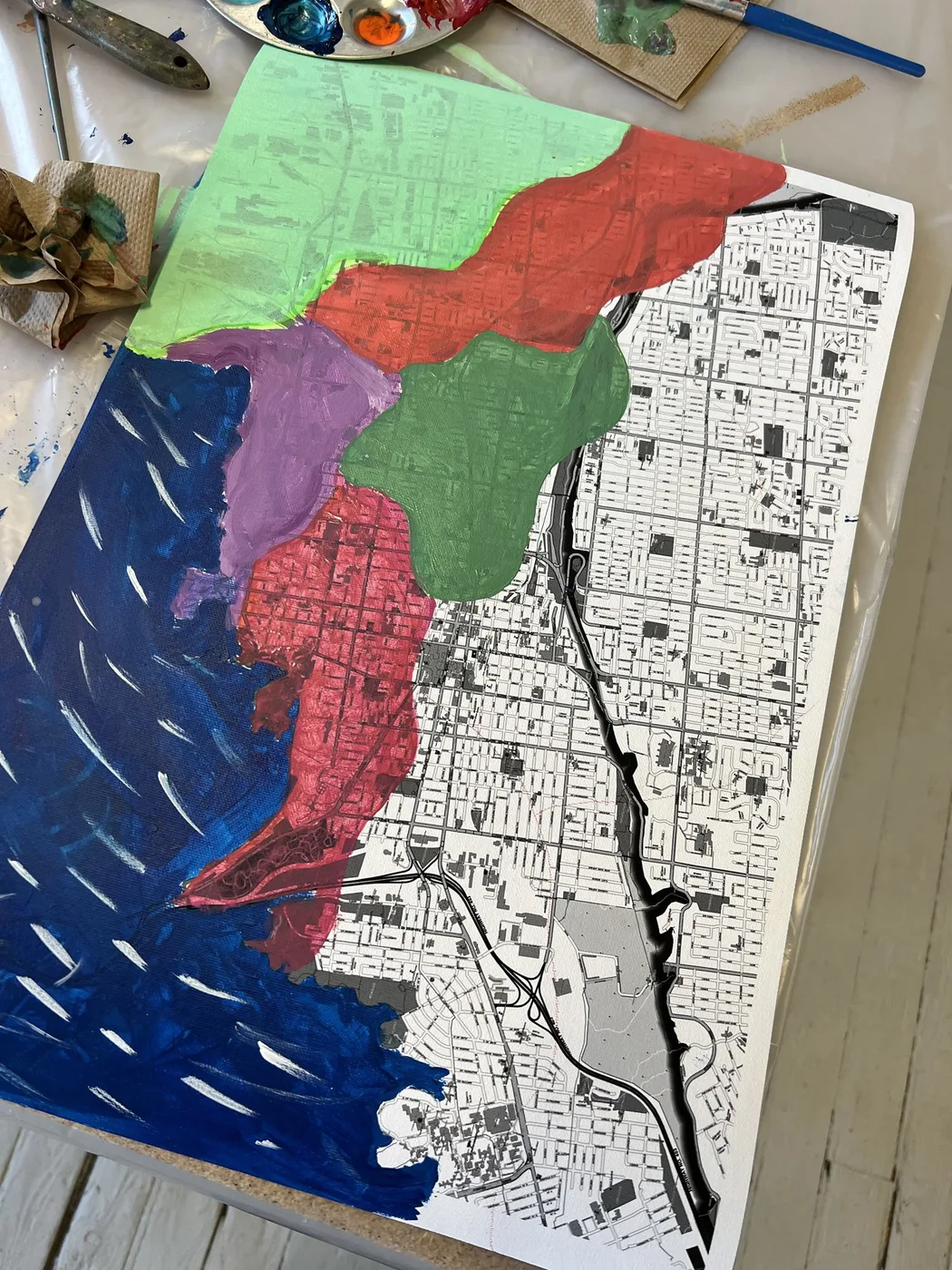 Map painted with a red river through green land