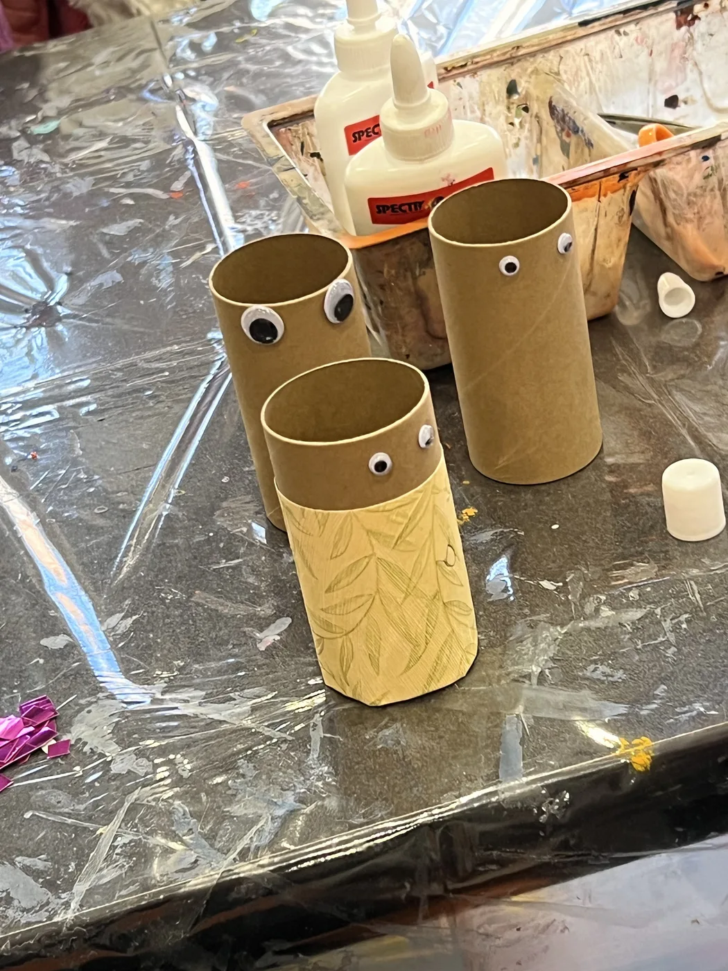 Cardboard tubes with googly eyes, just started