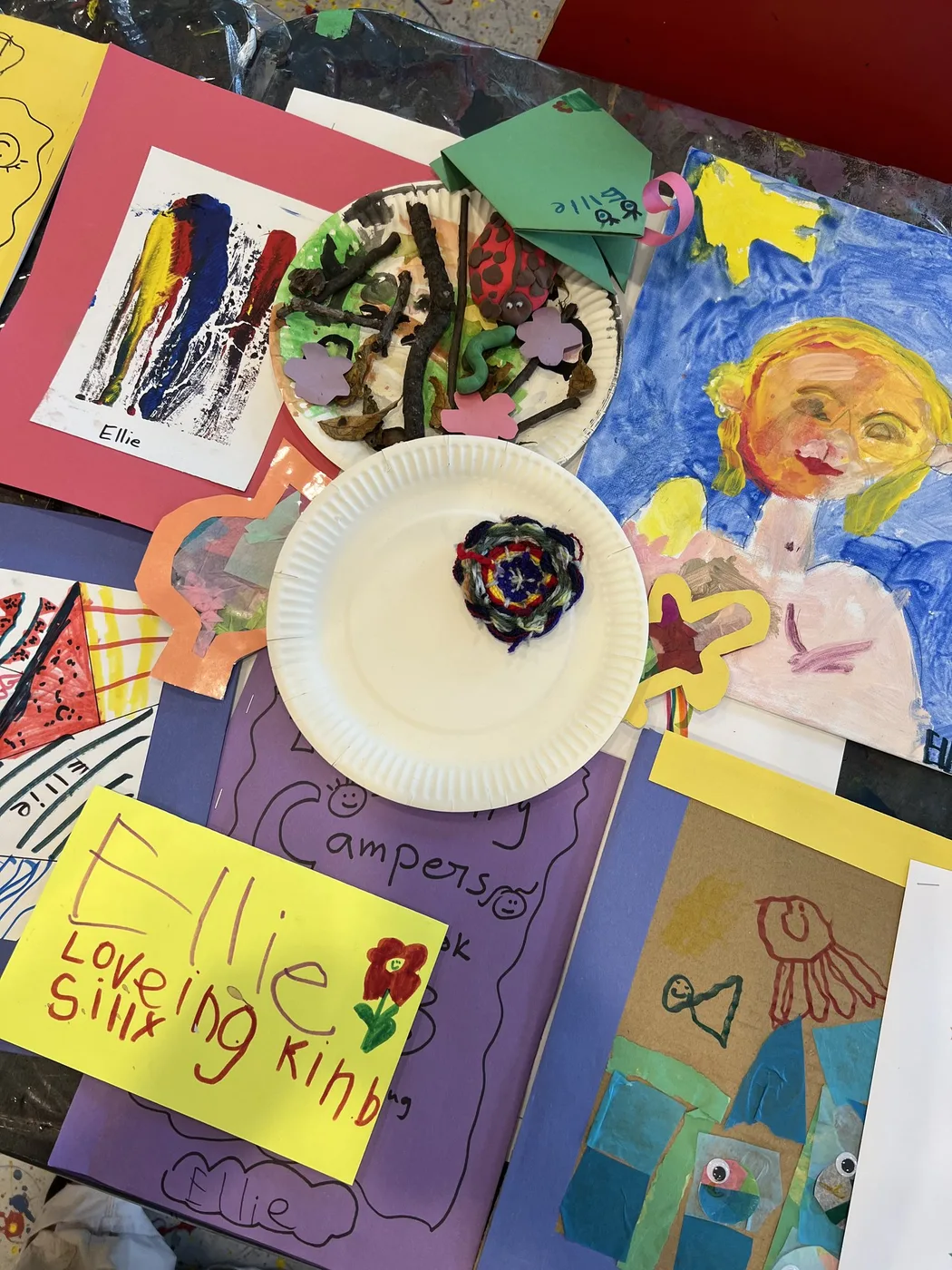 Camp portfolio with painted portrait and name card