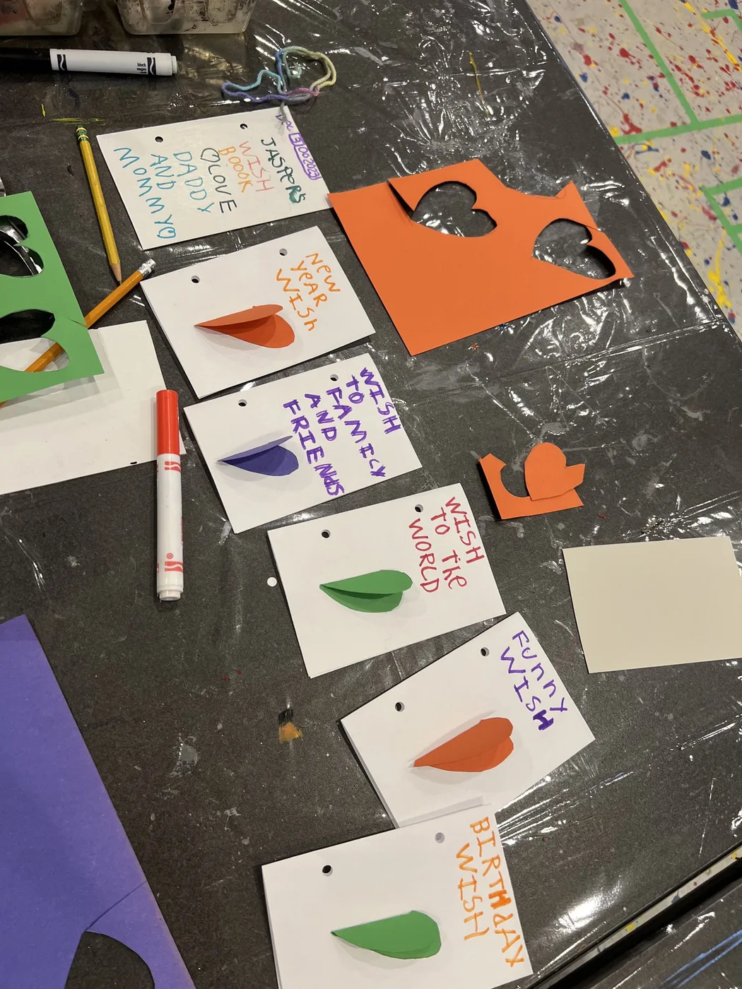 Wish cards with paper hearts and felt-tip lettering