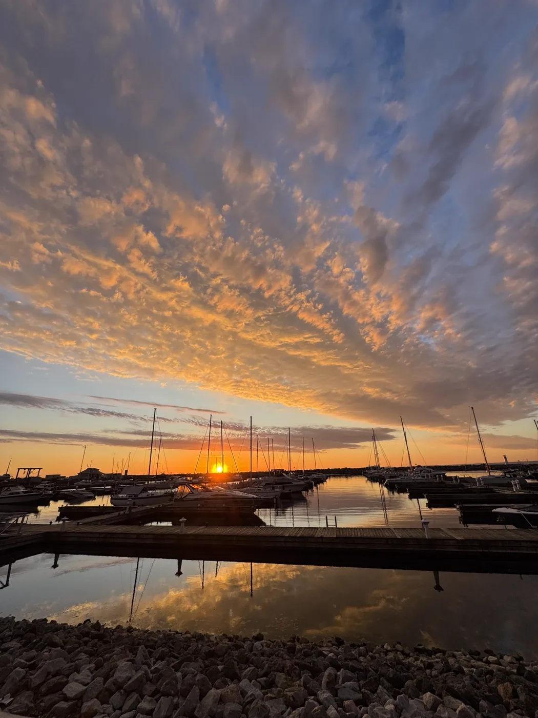 A sunset sky reflected in the marina