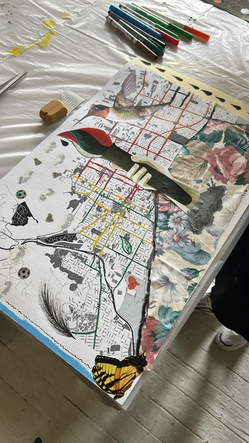 Birds, flowers and a painted brush.