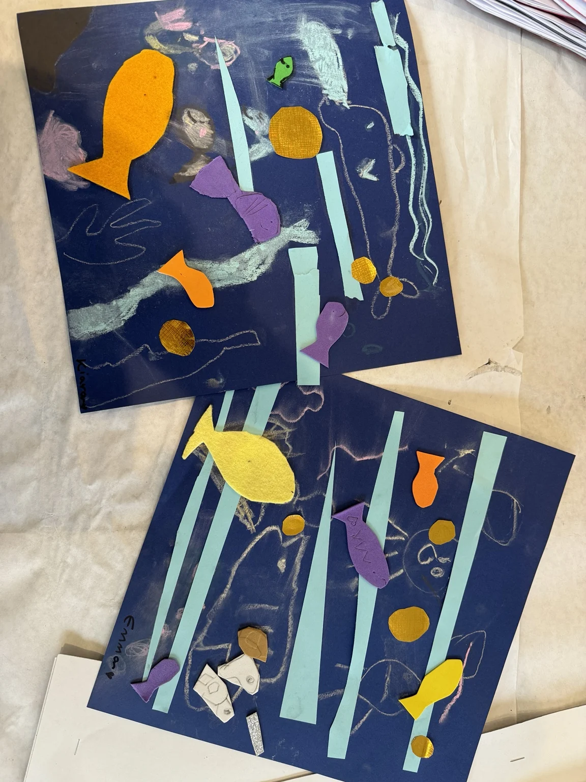 Fish and colour in two paper collages.