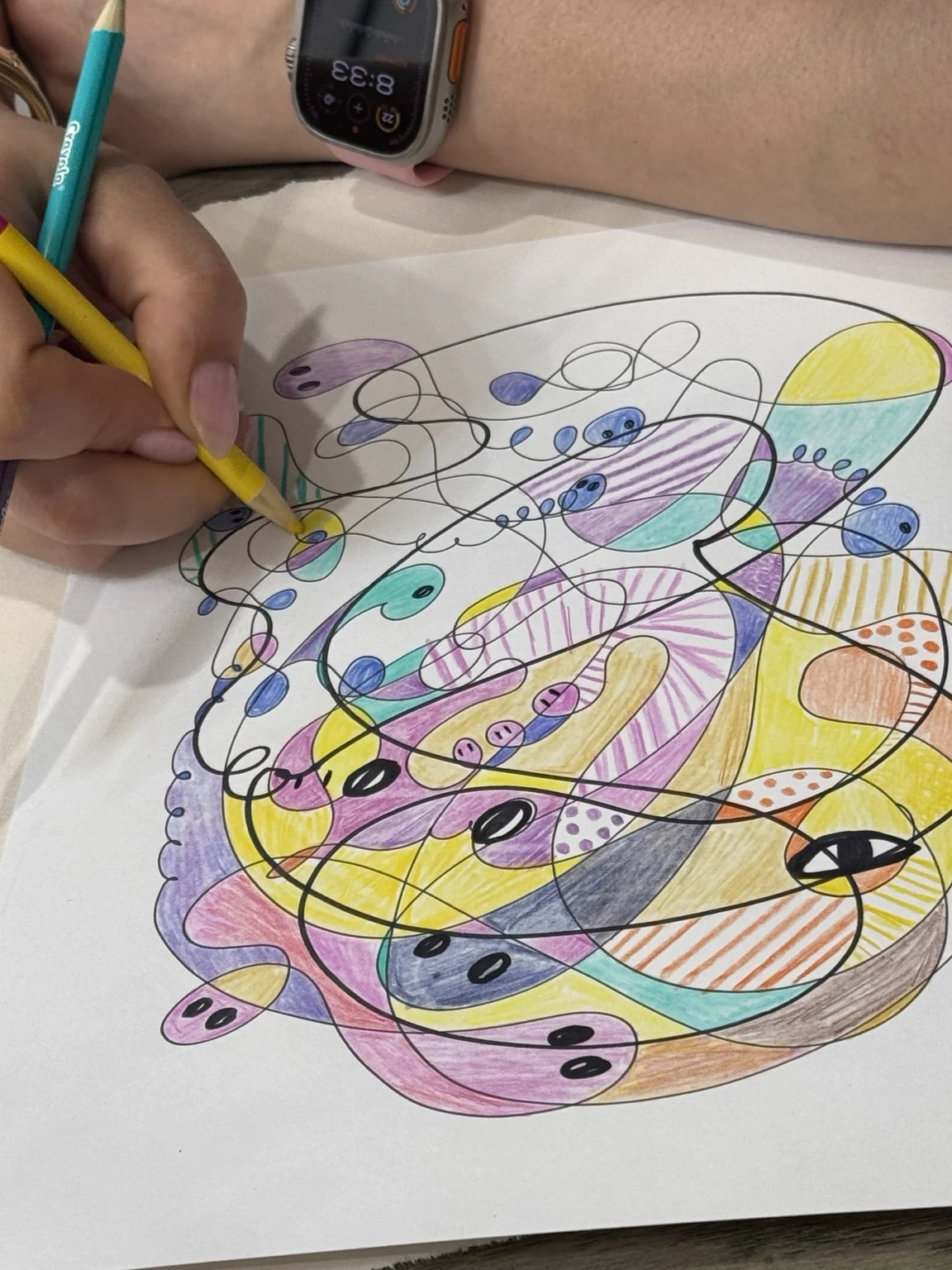 Colouring the loops and small shapes.