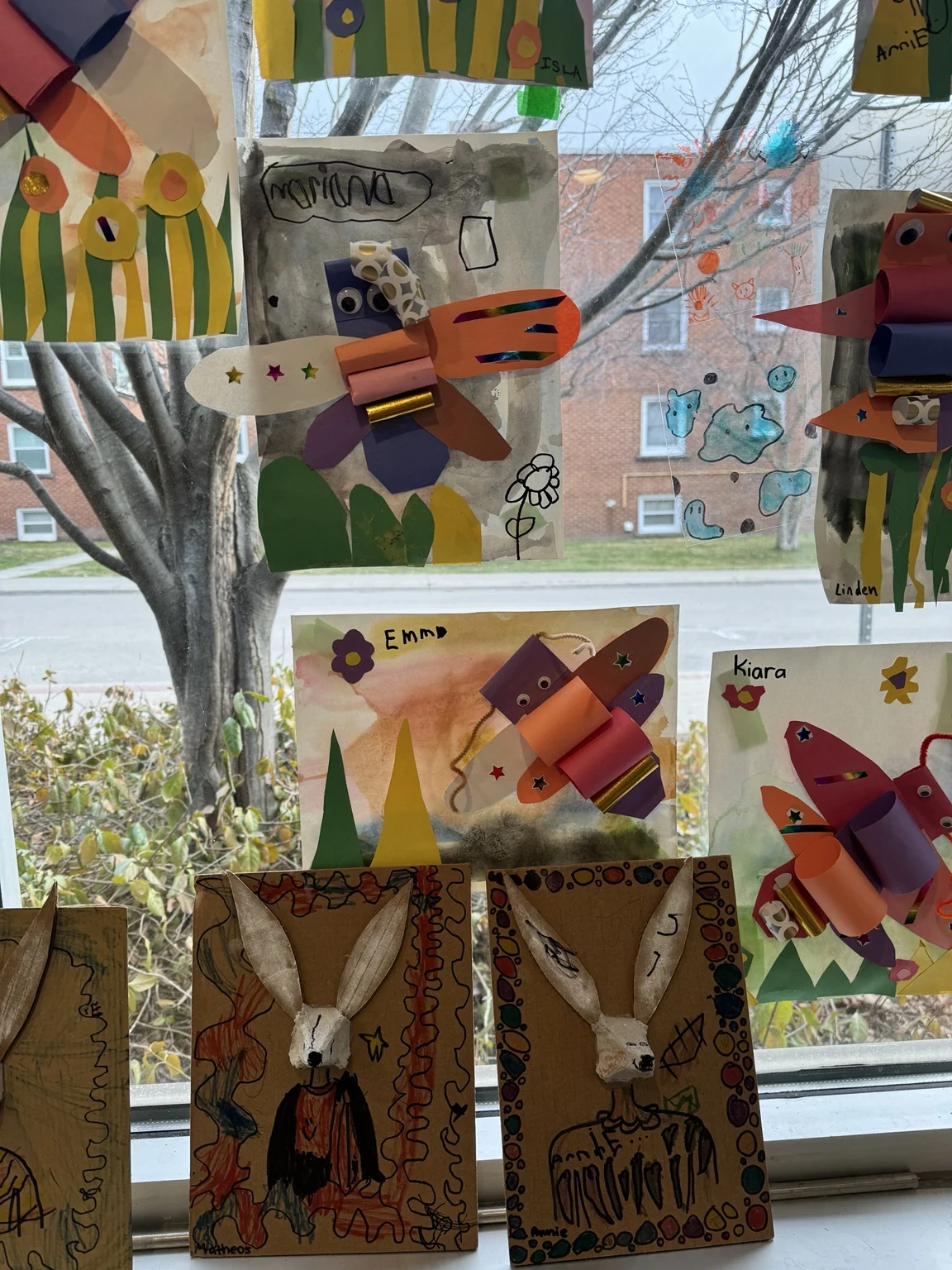 Finished works displayed in the studio window