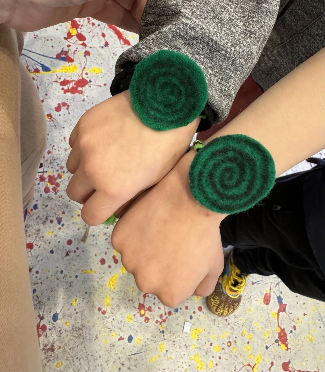 Yarn spirals worn at the wrist